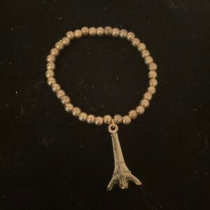 6” golden beaded stackable stretch bracelet with Eiffel Tower pendant & 39 beads